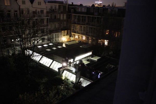 Cops in riot gear in the back courtyard. Getting ready to evict the squatters next door.