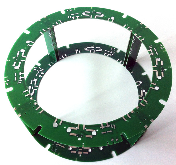 Magnetic resonance imaging coil built by the artist using a technique she pioneered through abstract visual thinking. The coil comprises of 4 separate loops built from 10 pieces of interlocking circuit board material. Built at the Max Planck Institute Department for Neurophysics in Leipzig.