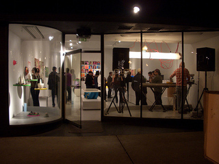 Gallery from street,Adder performing in window