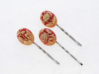 Lots of great barretts, bobby pins and earrings by local designer Sprout Studio (featuring vintage findings),