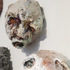 Detail_two_suffering_heads