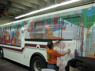 View of Art on Transit bus being wrapped,Ray CRO Noland