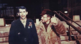 Vytautas Landsbergis and a cardboard figure of Colonel Oliver North,
