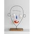 20110318014816-upcoming3104_calder_little_face--wht-border-