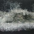 20110412060634-5_wave_breaking_over_rock__xi