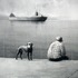 20110518101255-dog_man_and_departing_boat