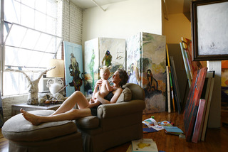 Photo of artist Courtney Reid in studio,