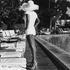 20111217191614-afr_woman_by_pool