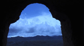 Jayce Salloum. Inside looking out, sky and hills (Buddhas cave site), from "..the heart that has no love/pain/generosity is not a heart..", Bamiyan, Hazarajat, Afghanistan,Jayce Salloum