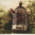 20120112053416-caged-bird-sing