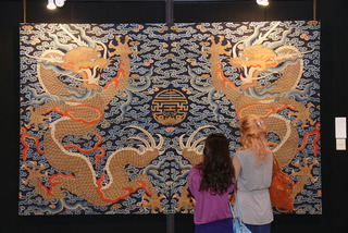 A magnificent Imperial 18th century, Qianlong period, kesi (tapestry weave) panel with two confronting five-clawed dragons, exhibited by Jacqueline Simcox, London.,