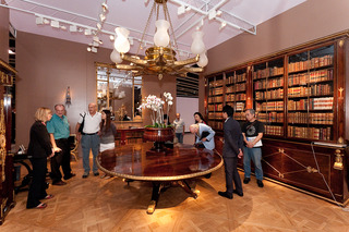 Carlton Hobbs, New York, reconstructed an entire elegant English drawing room at his booth, complete with a giant 22-foot rosewood table used for a 19th century royal peace treaty, a 400 lb chandelier, a wall-sized bookcase full of books and a hardwood pa,