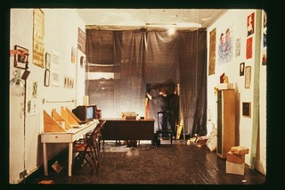 installing the exhibition “Income and Wealth” at 5 Bleecker Street,Coleen Fitzgibbon