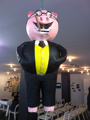 Capitalist Pig Piñata courtesy of Scott Hug,