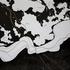 20121116111954-joan_hus_black_and_white_fluttering_shapes_resized