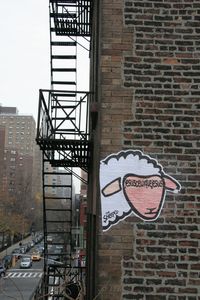 20121218042019-a_sheep_around_a_fire_escape