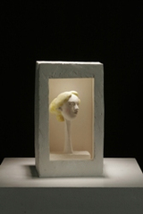 20130502025138-jonathan_shahn-head_of_a_woman_with_yellow_hair_on_long_pole